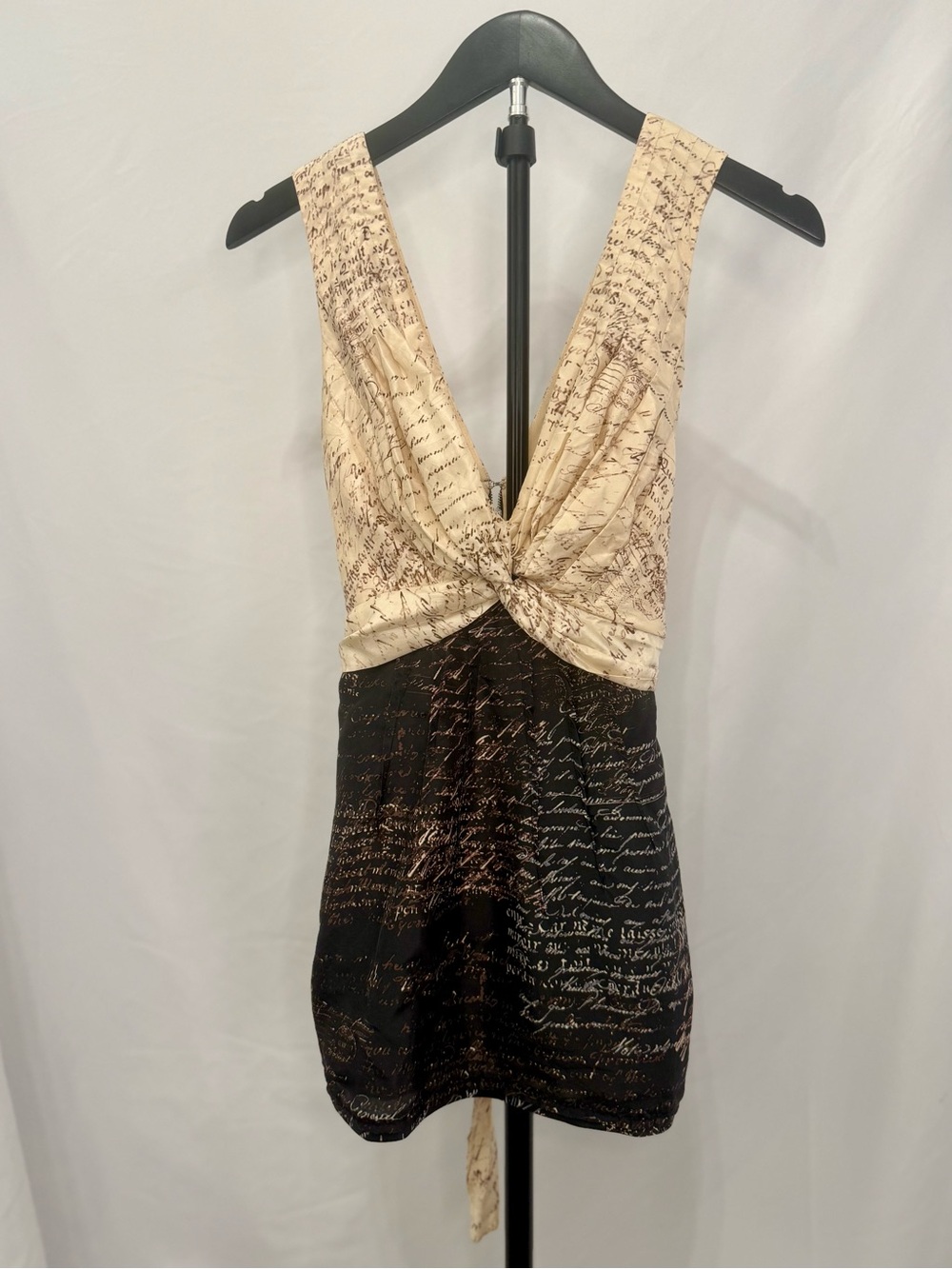 BCBGMaxAzria Cream and Black Script Twist Sleeveless Blouse